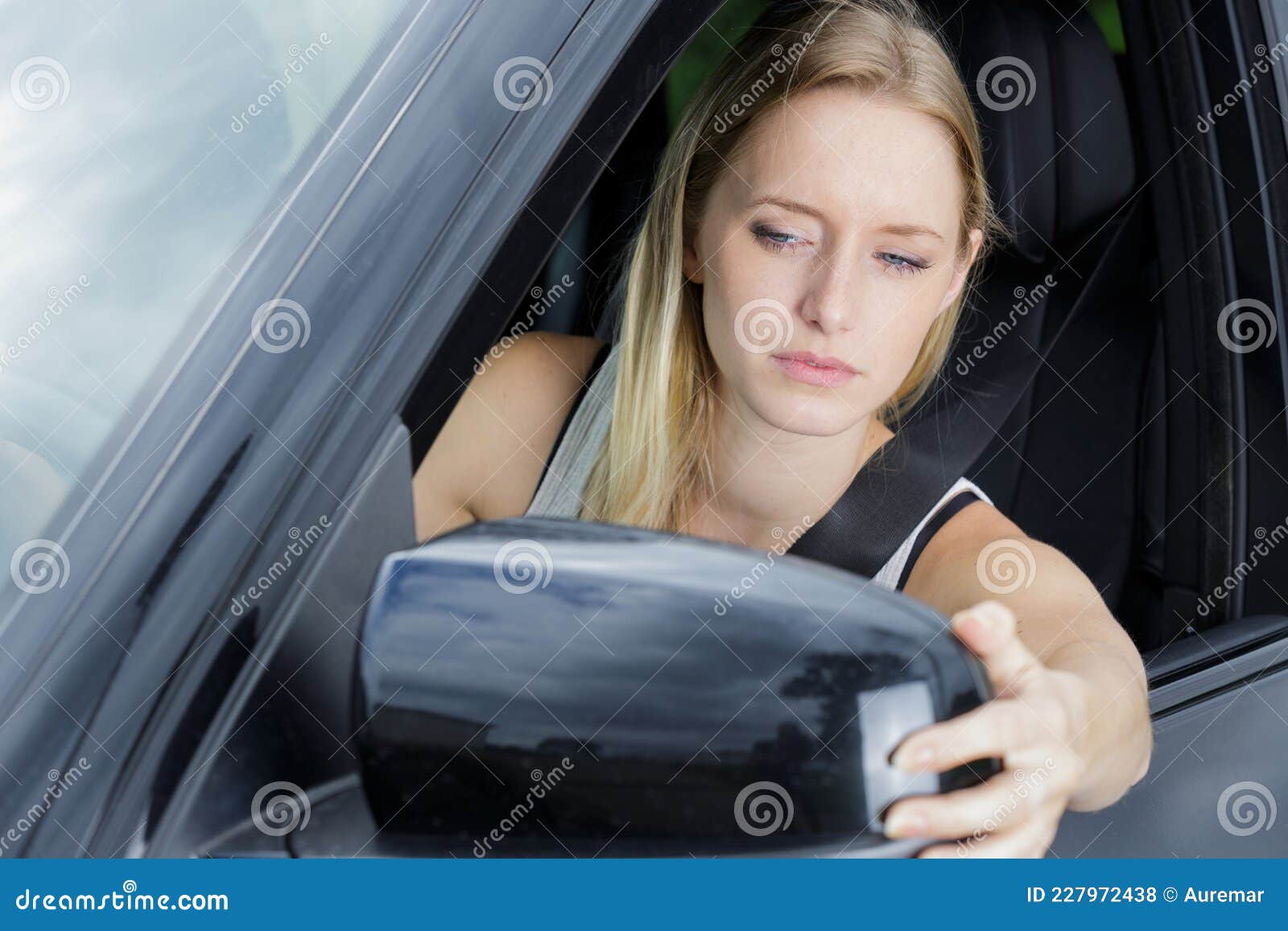 Young Woman Adjusting Side Mirror Stock Photo Image of seat, autumn 227972438