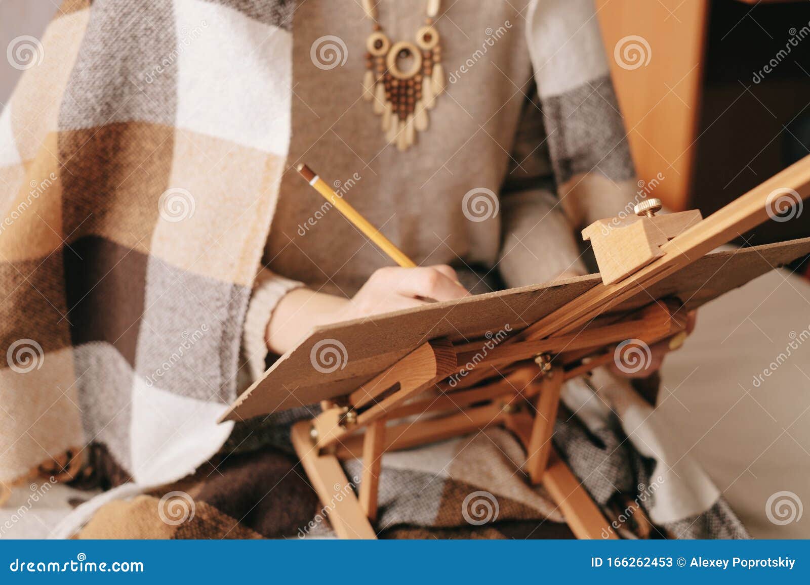 Woman Artist Drawing on Paper Easel with Pencil. Stock Image - Image of ...