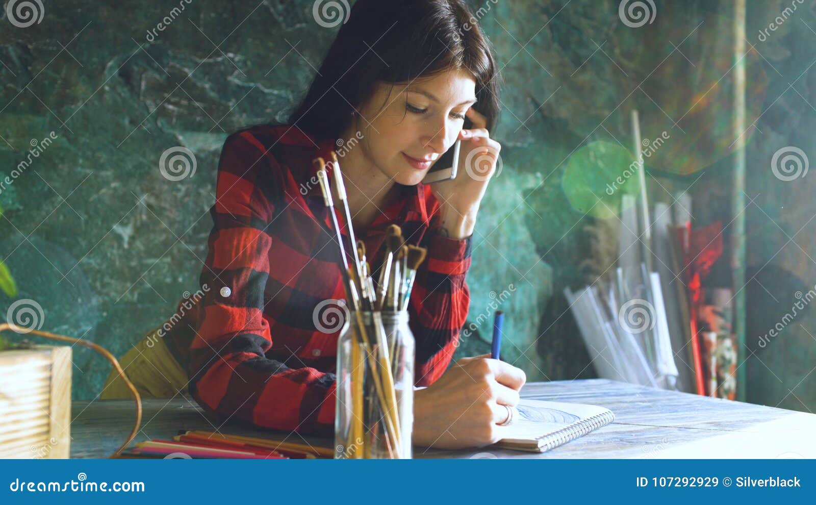Young Woman Artist Painting Scetch on Paper Notebook with Pencil and ...
