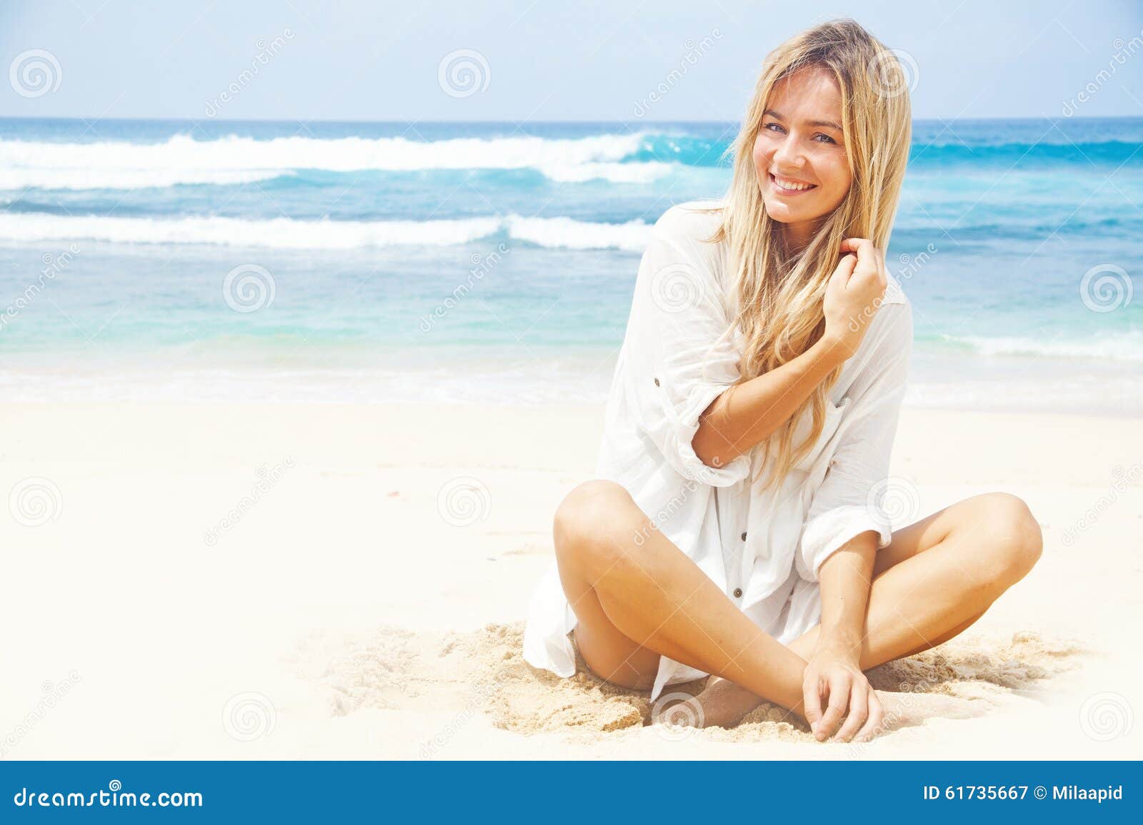 Young woman at the beach stock image. Image of adult - 61735667