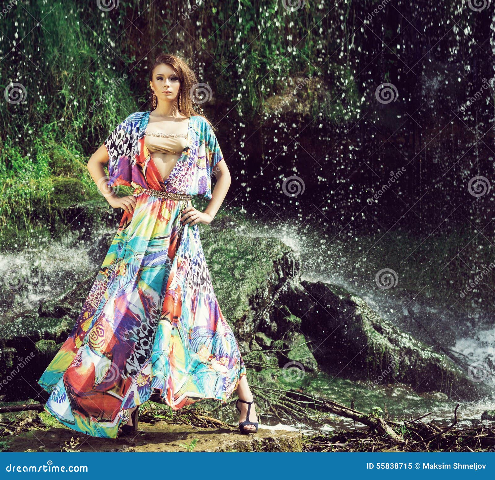 Young Woman in a Beautiful Fashion Dress Posing Outdoors Stock Image ...
