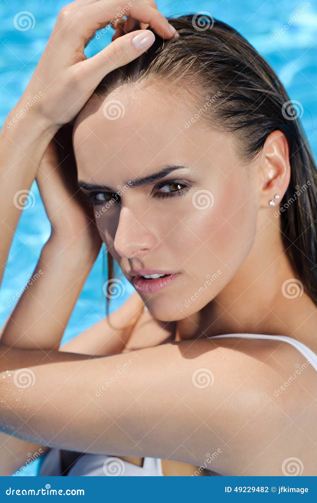 young woman beauty portrait in water