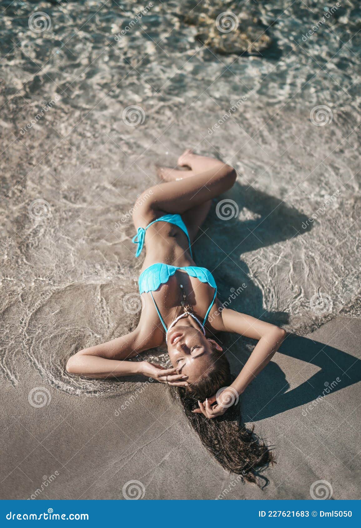Young Woman with Big Breast is Lying on the Sand in Warm Waves of Clear  Tropical Sea. Summer Vibes Stock Image - Image of happy, legs: 227621683