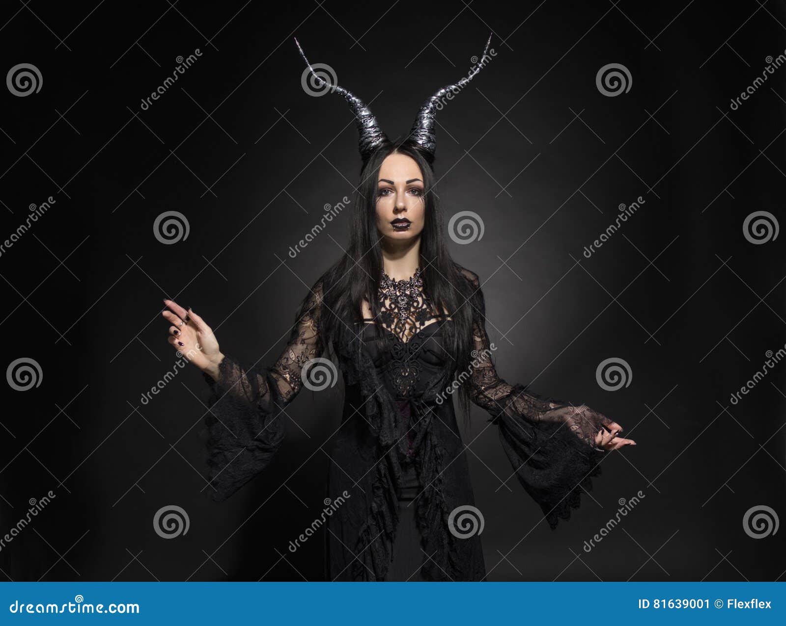 young woman in black fantasy costume