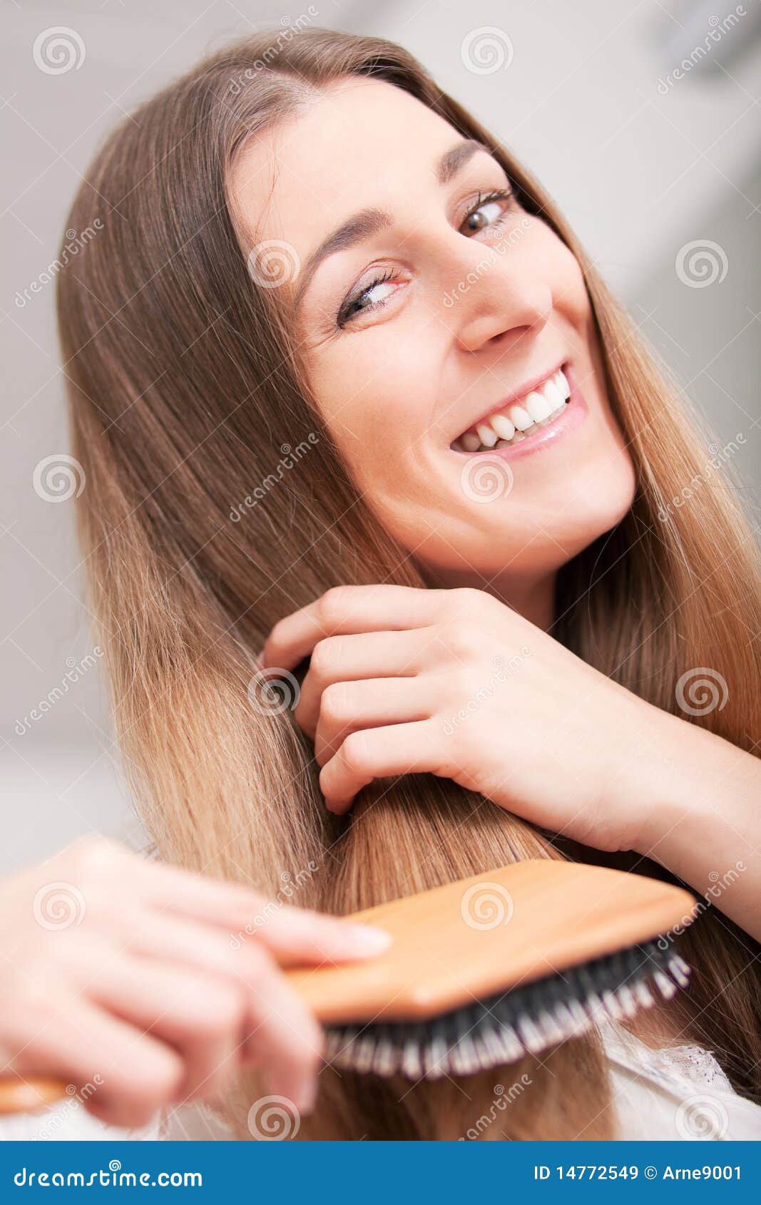 Young Woman Brushing Her Hair St