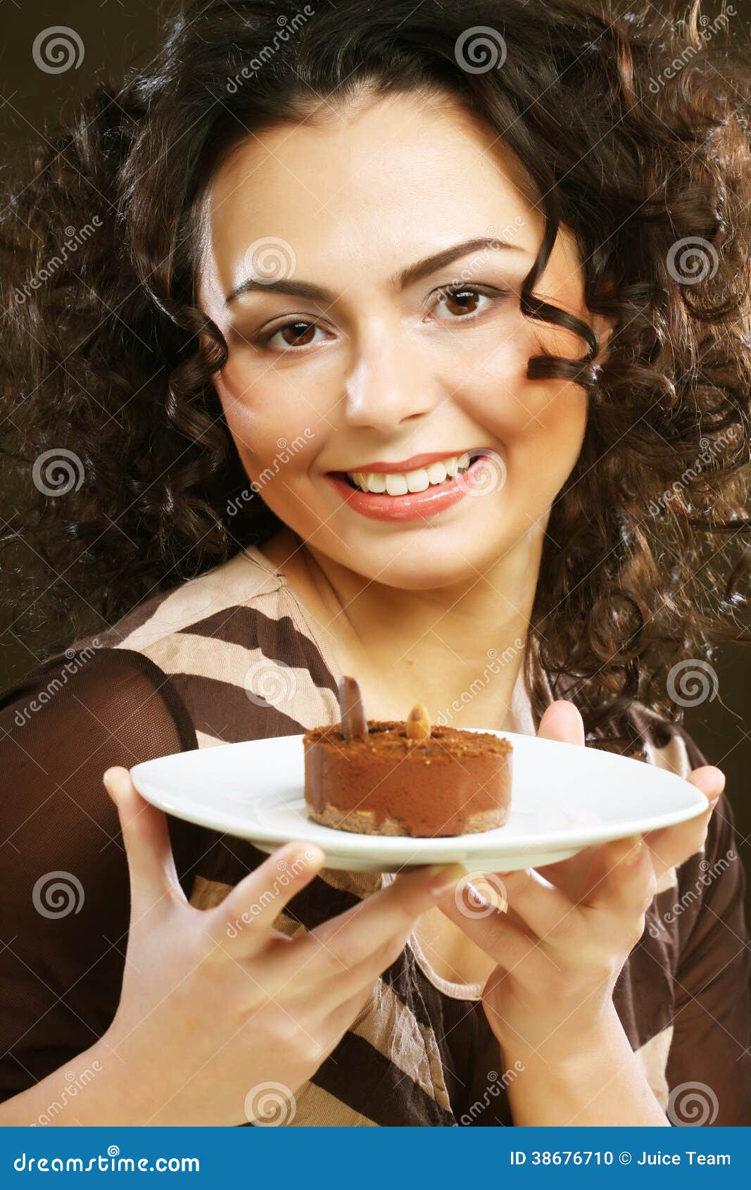 Young woman with a cake stock photo. Image of appetite 38676710