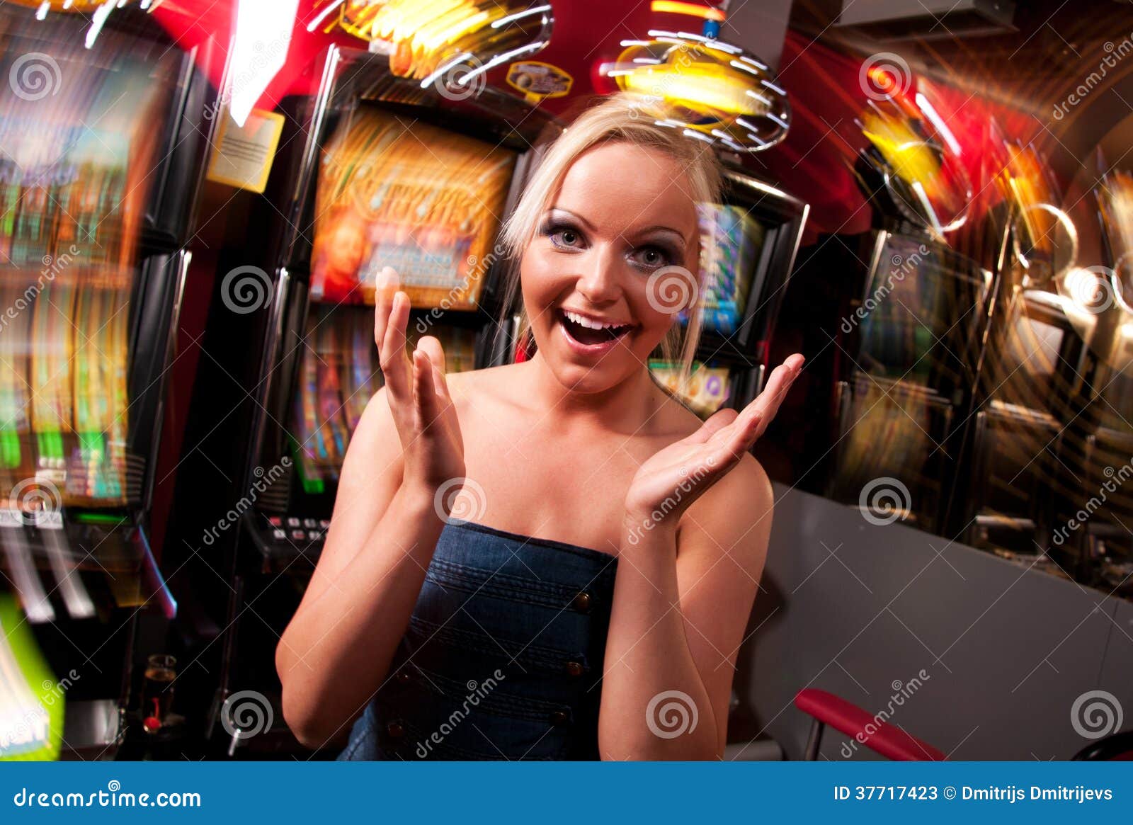 Young Woman In Casino On A Slot Machine Stock Photo 