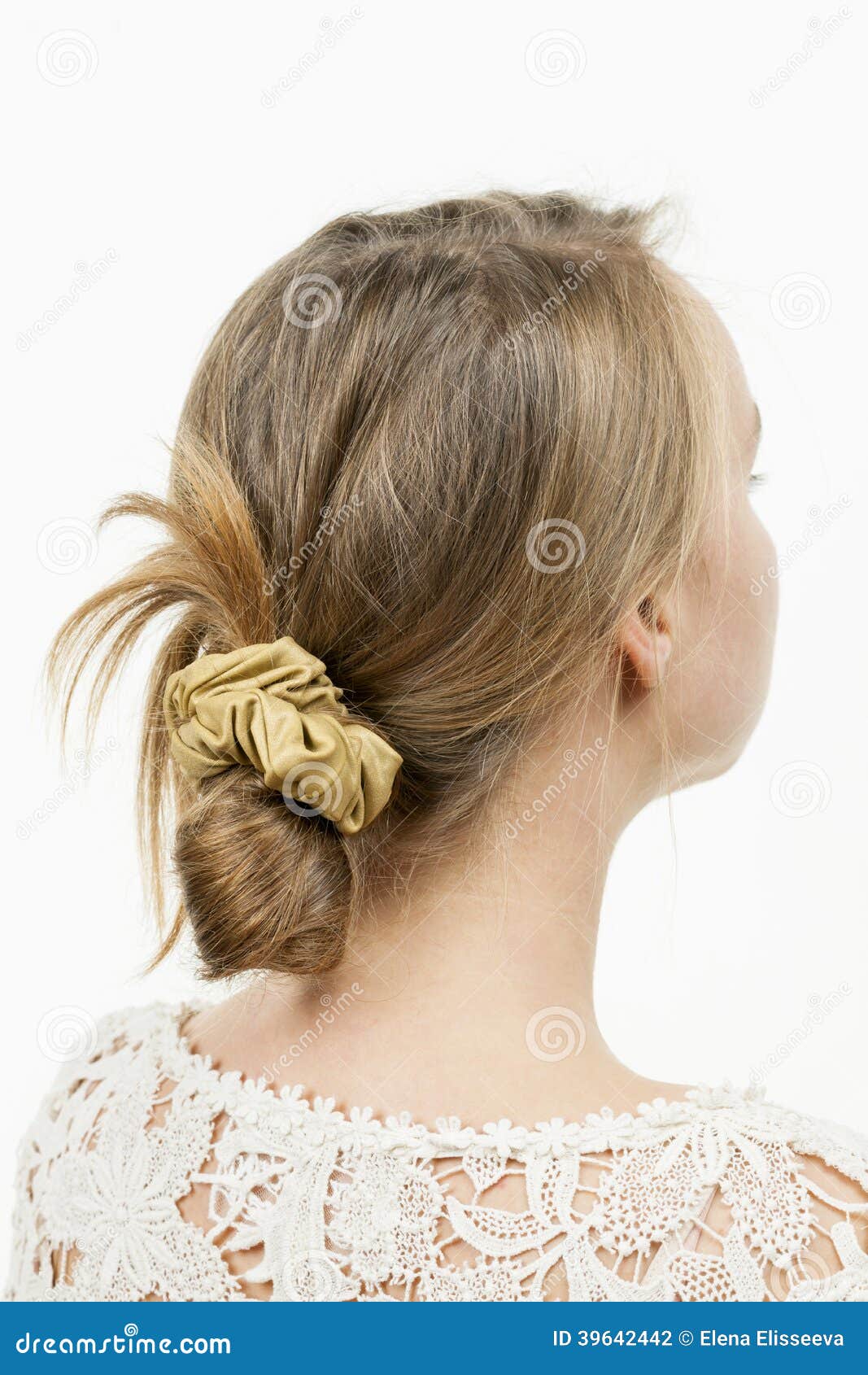 young woman casual messy bun hairdo studio shot chignon hairstyle 39642442