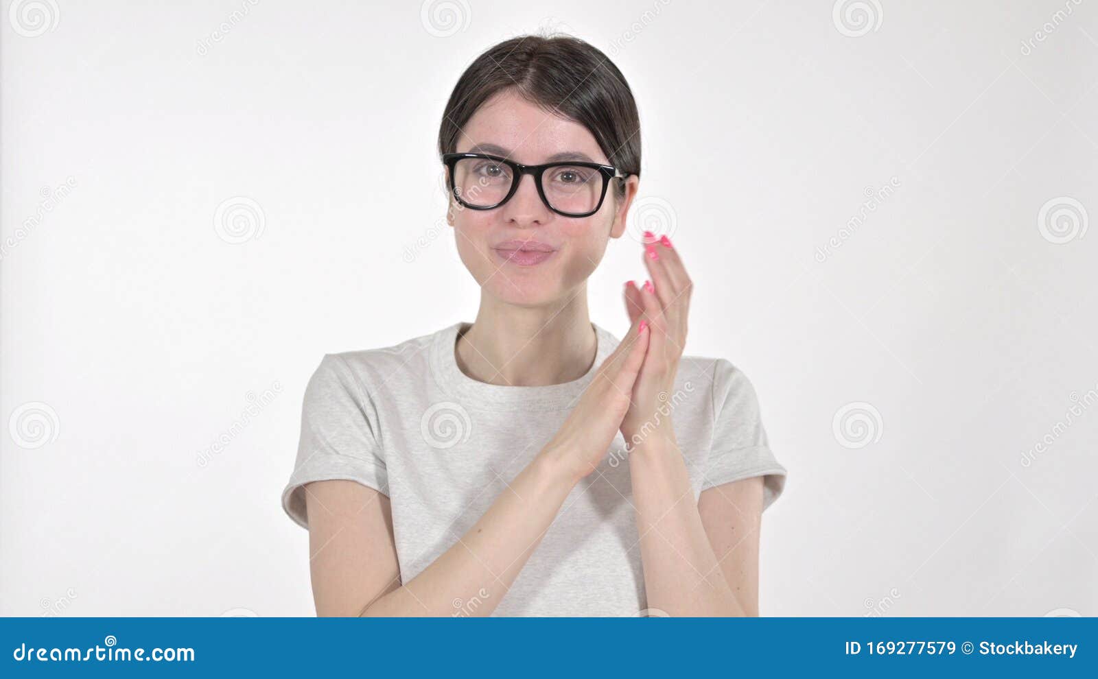 The Young Woman Clapping with Hands on White Background Stock Image ...