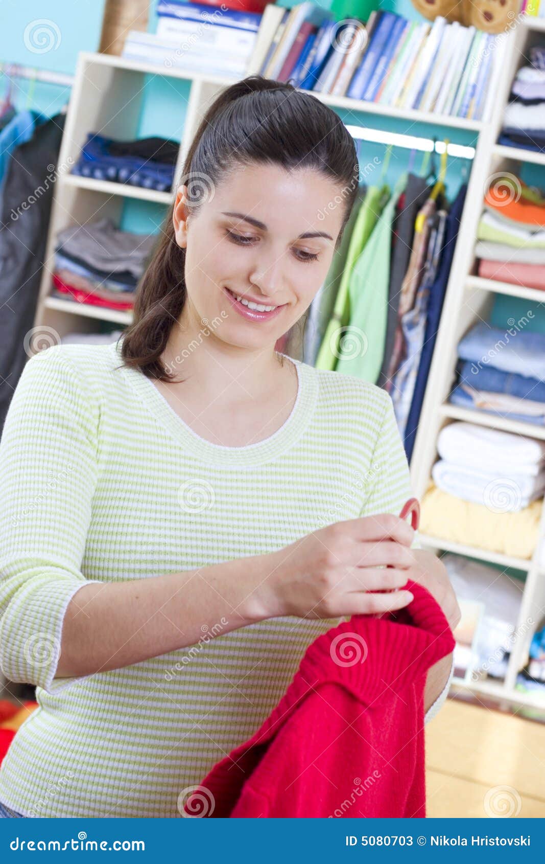 Young woman with clothes stock image. Image of housewife - 5080703