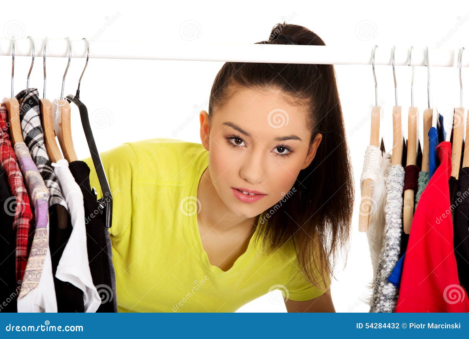 Young Woman with Clothes on Hanger. Stock Photo Image of hanger