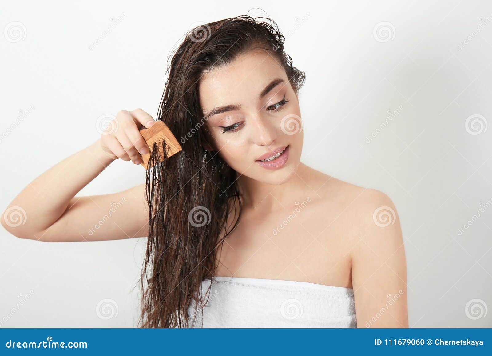 Young Woman Combing Hair after Shower Stock Photo - Image of person,  isolated: 111679060