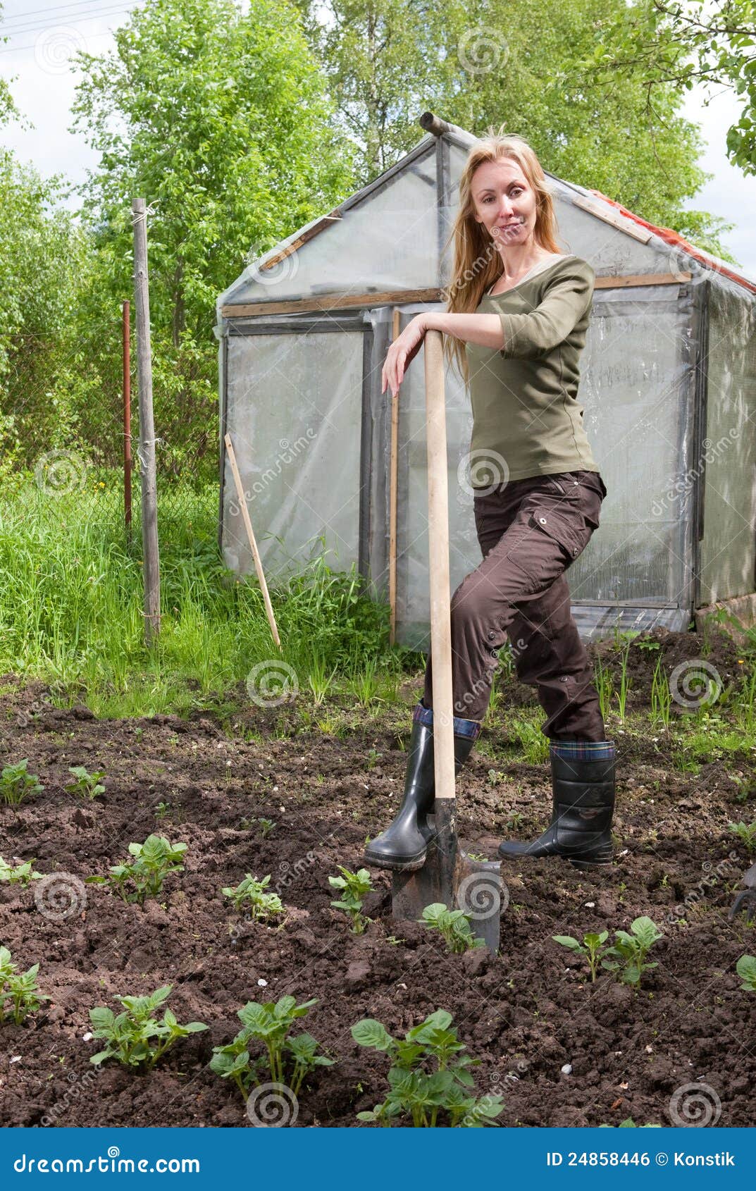Young Woman Couch a Gardenbed with the Sprouts Stock Photo Image of