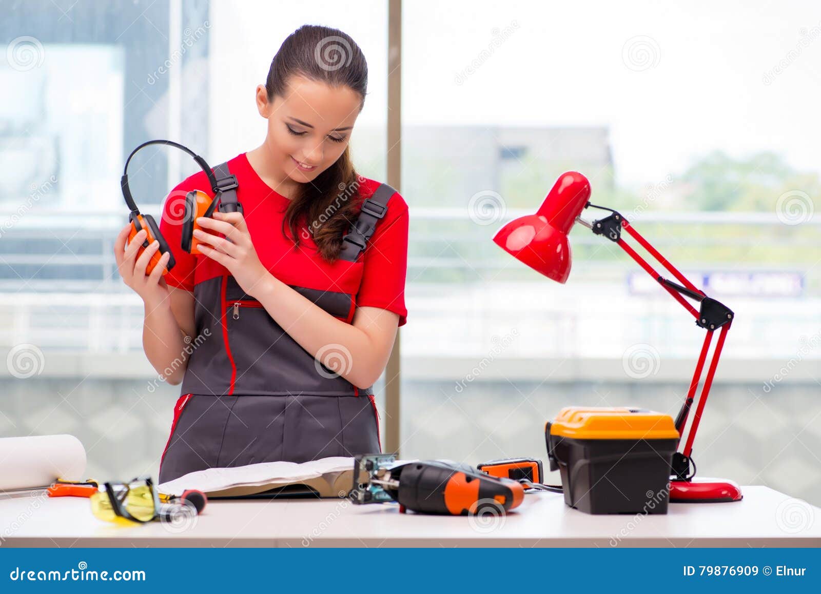 The Young Woman in Coveralls Doing Repairs Stock Image - Image of ...