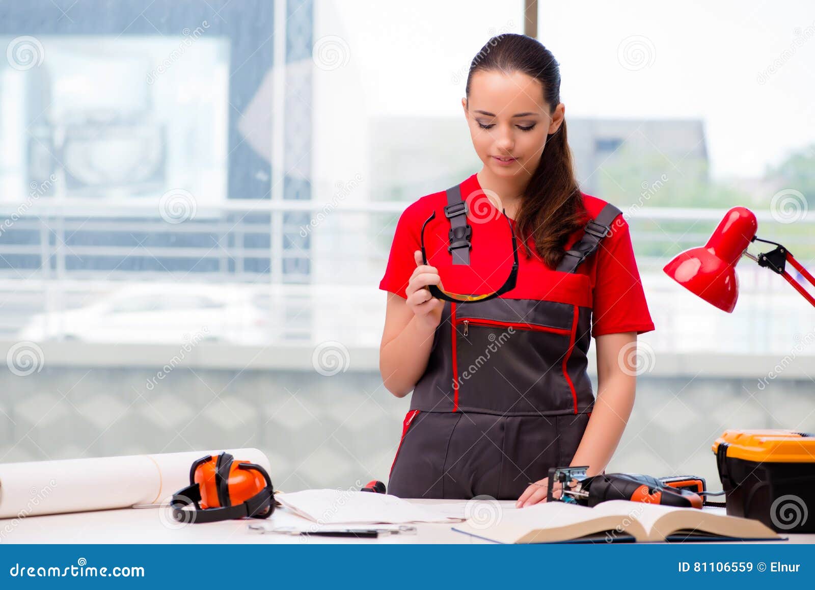 The Young Woman in Coveralls Doing Repairs Stock Image - Image of ...