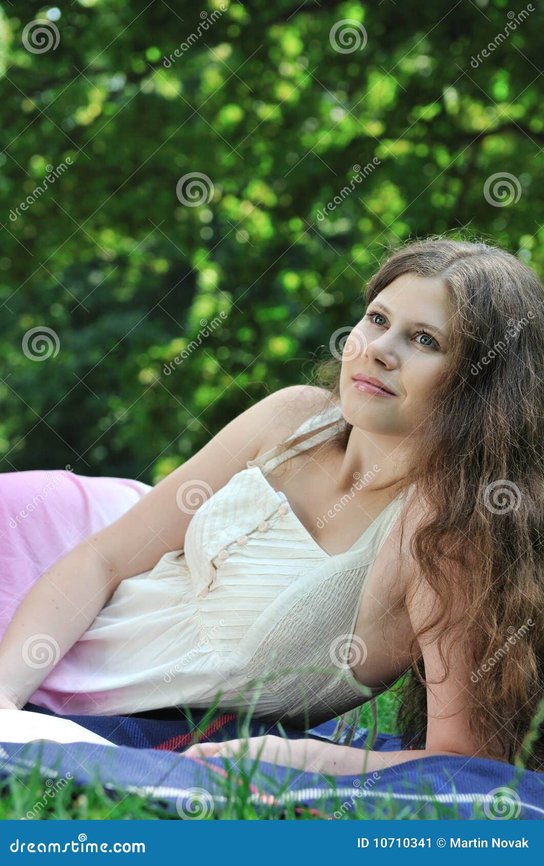 Young Woman Daydreaming in Park Stock Image - Image of dream, smile ...