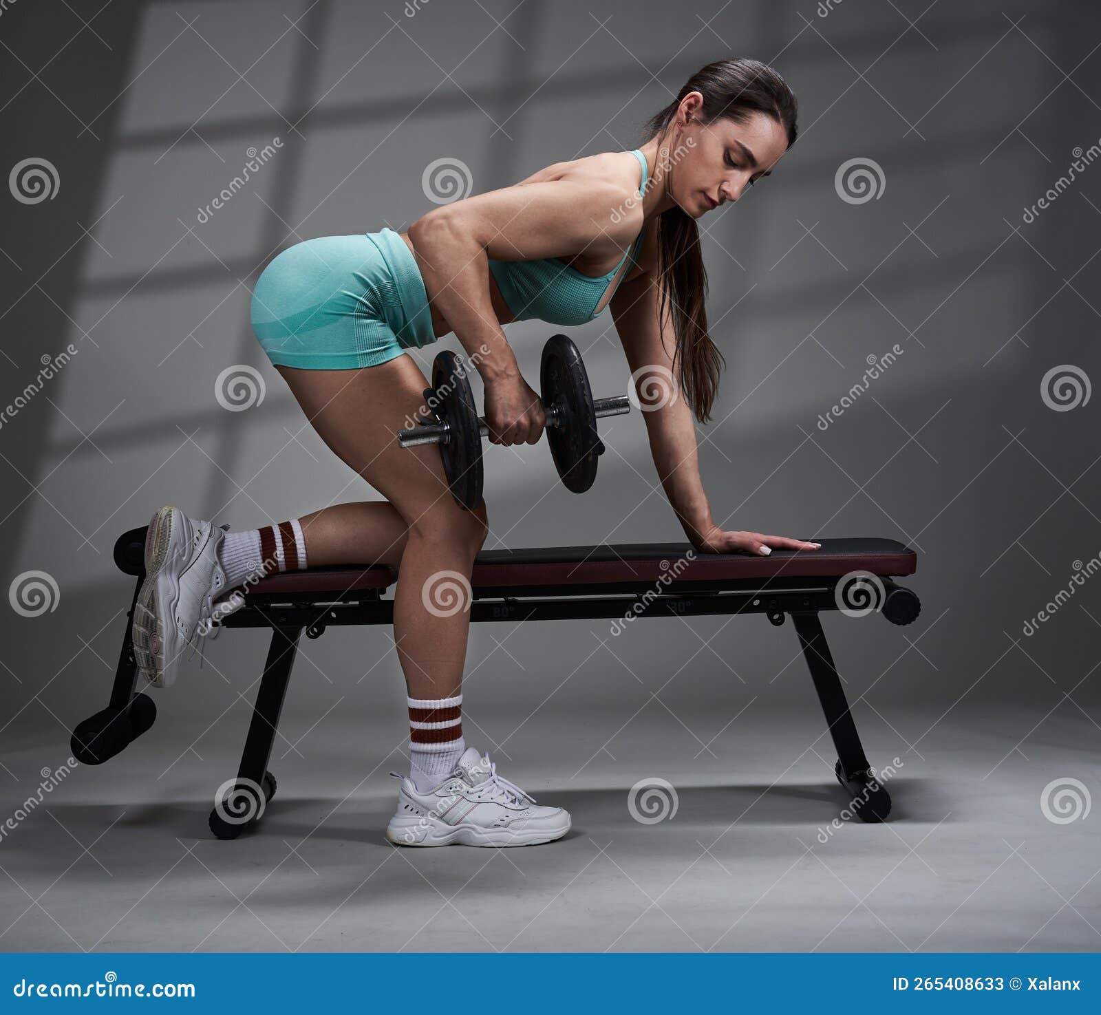 Premium Vector  Arms dumbbell row exercise, young female athlete doing  fitness exercise, fitness at home.