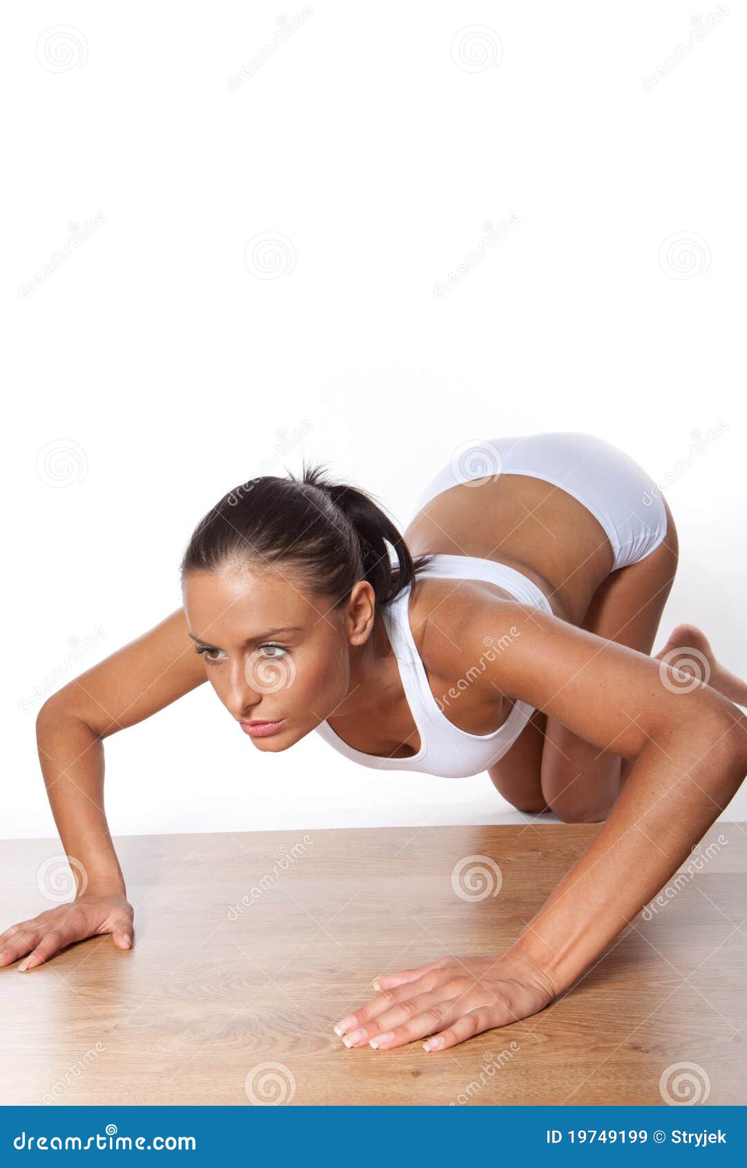Young Woman Doing Pushups stock image. Image of acrobatics 19749199