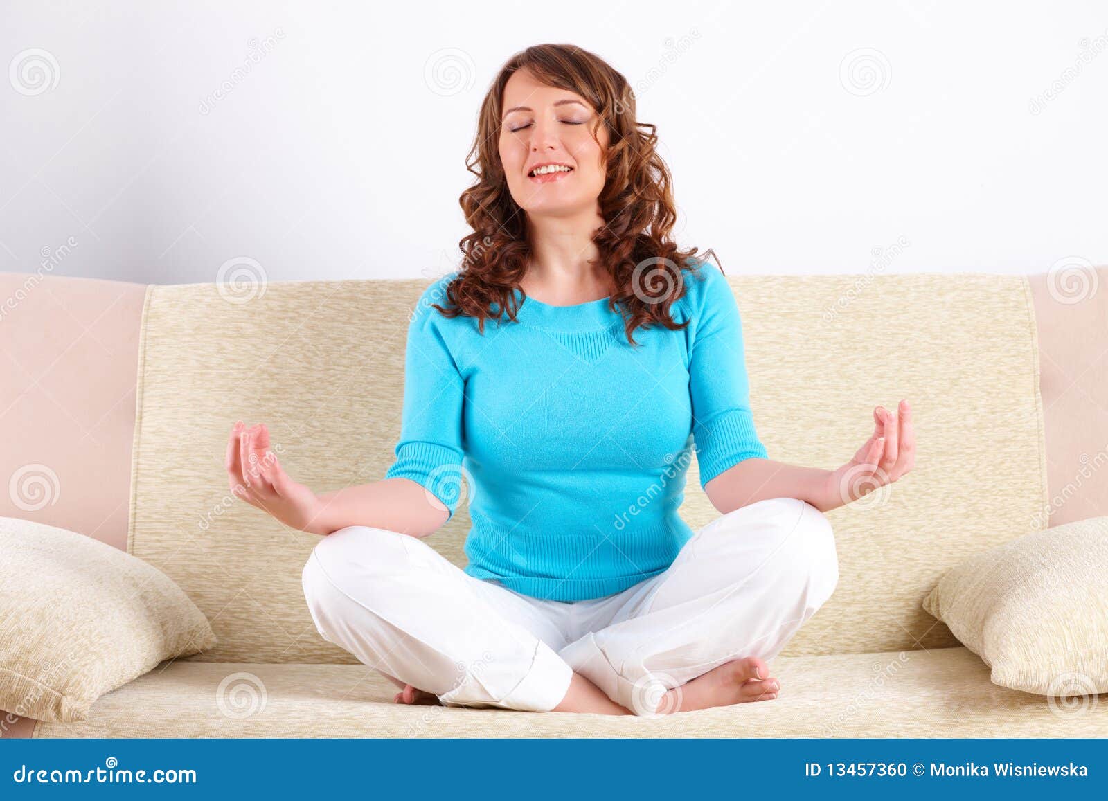Young Woman Doing Yoga Exercise on Sofa Stock Photo Image of beauty, people 13457360