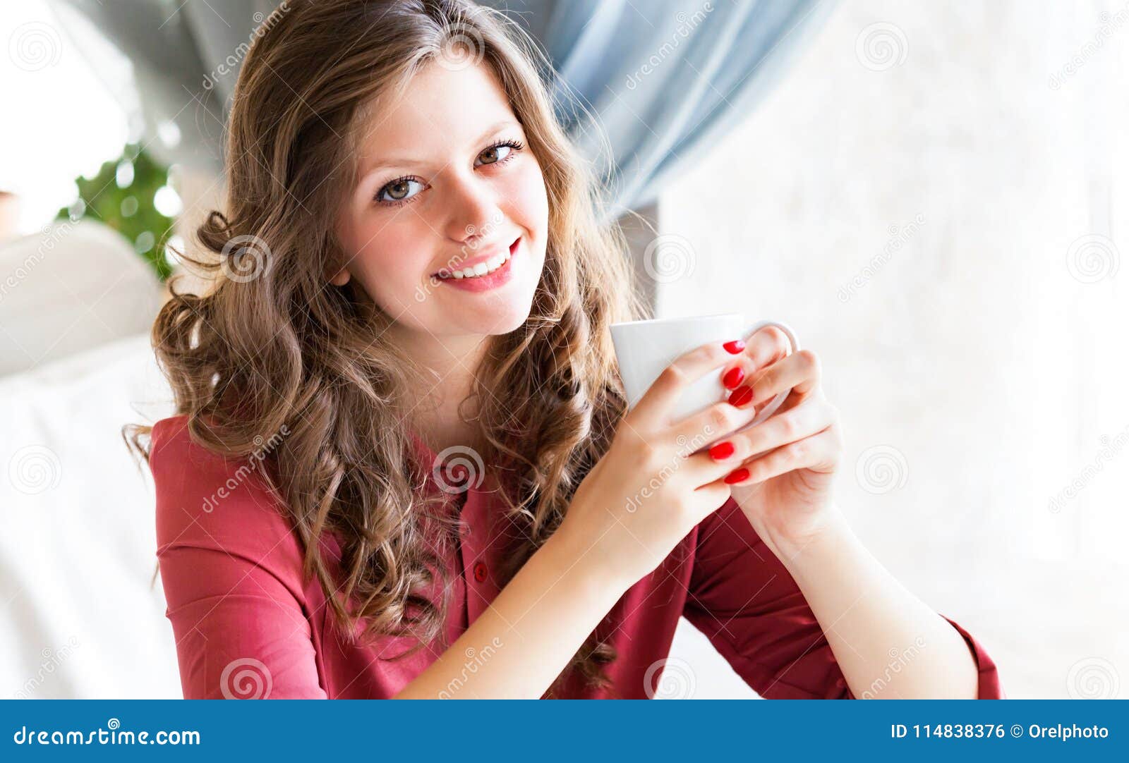 Young Woman Drinking Hot Coffee in a Cafe Stock Photo - Image of beauty