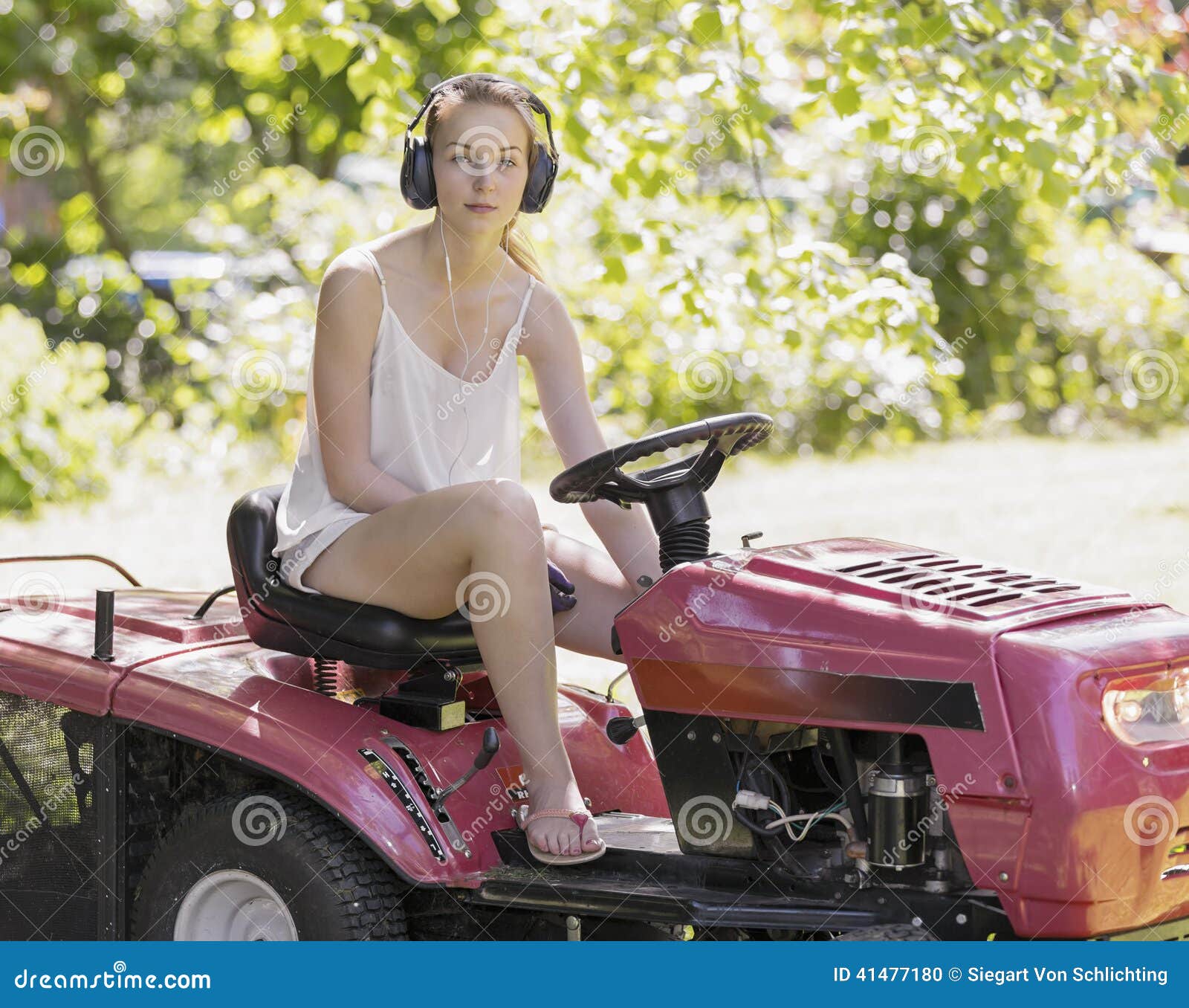 Young Woman Driving A Ride On Mower Stock Photo - Image: 41477180