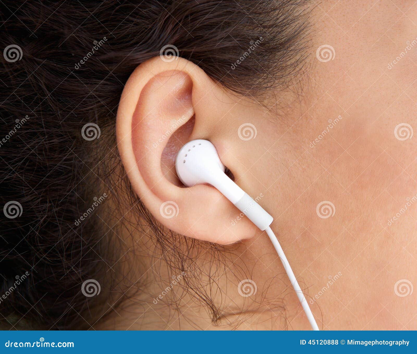 young woman ear with earphone