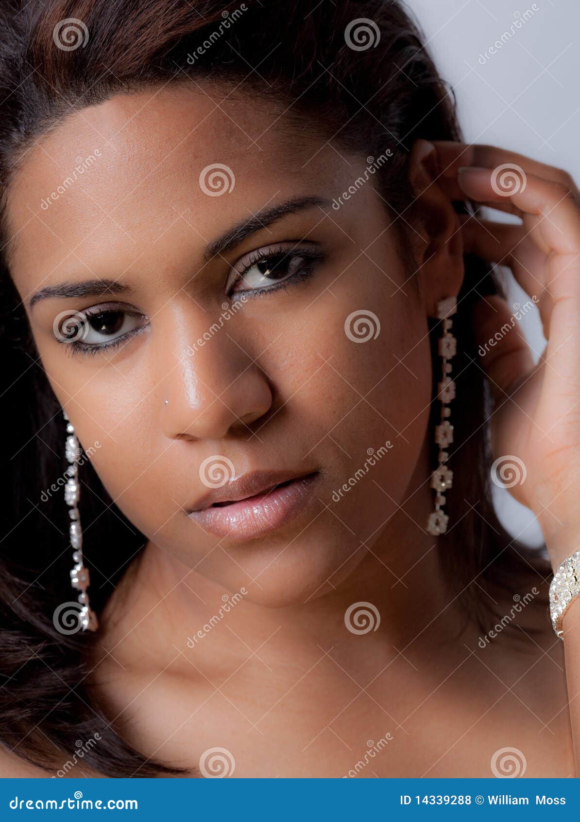 Young Woman in Earrings stock photo. Image of jewelry 14339288