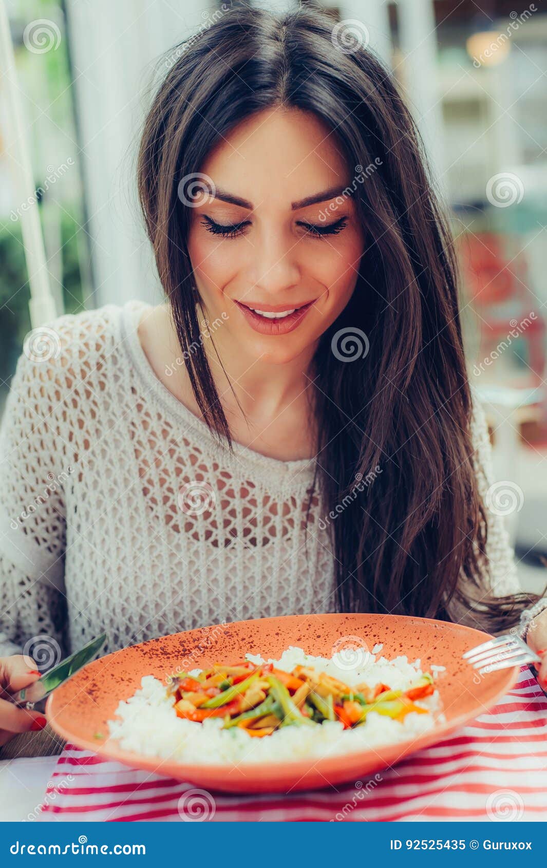 Young Woman Eating Chines