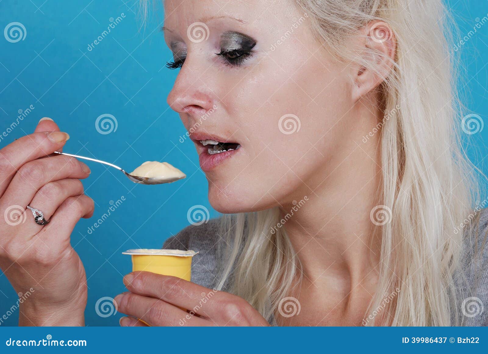 Young woman eating cream stock image. Image of mouth 39986437