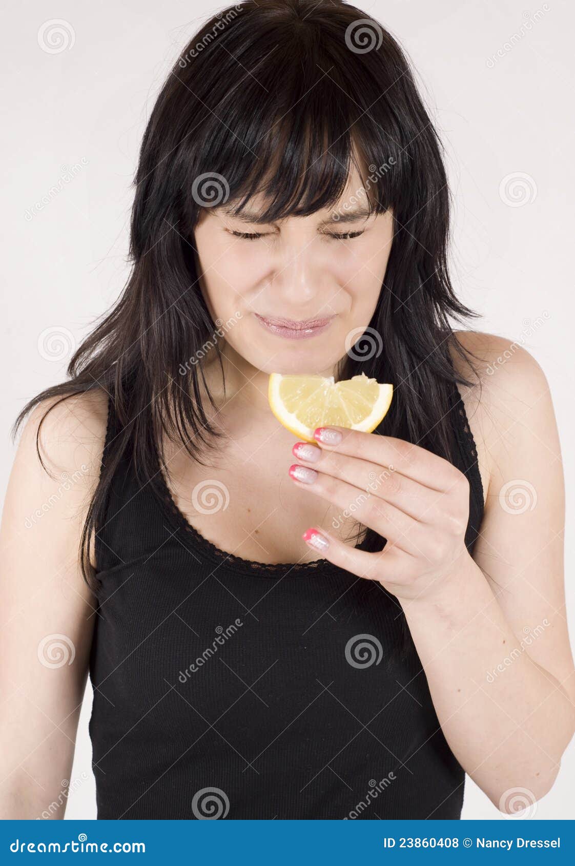 Young Woman is Eating Fresh Citrus Fruit Stock Photo Image of fruits, grimace 23860408