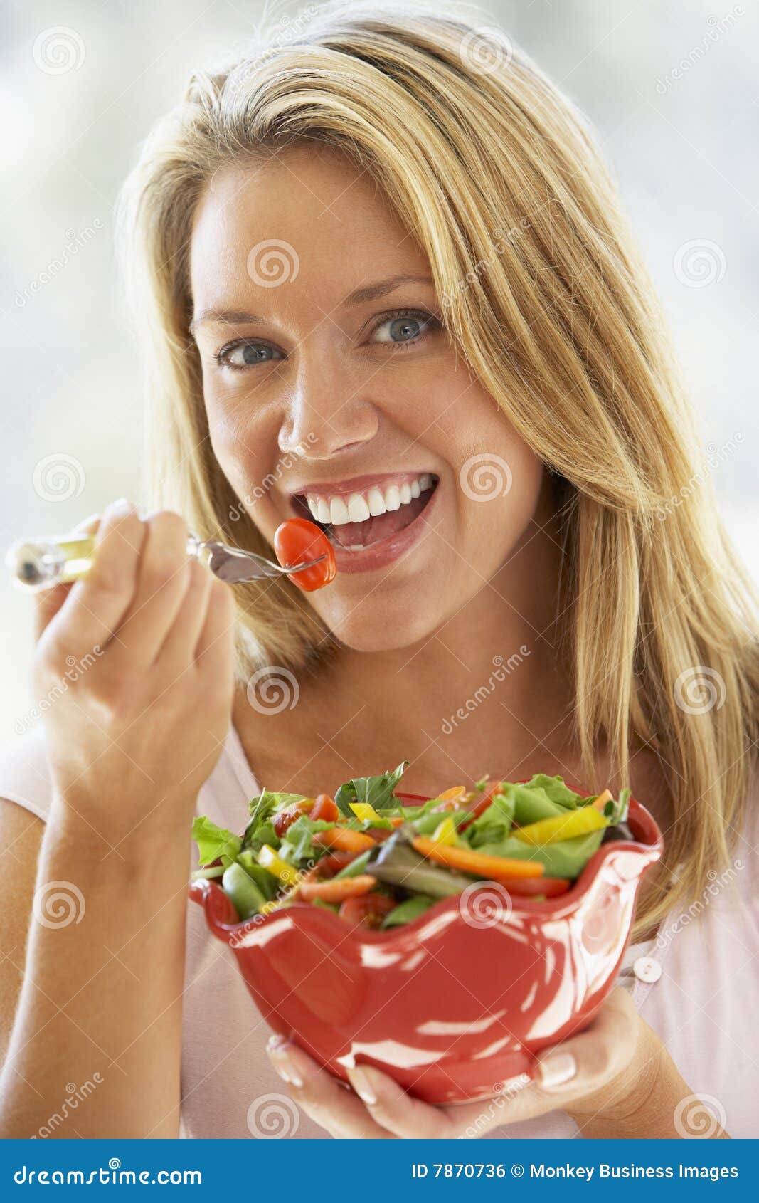 Young Woman Eating Fresh Salad Stock Photo Image of diet, clothing