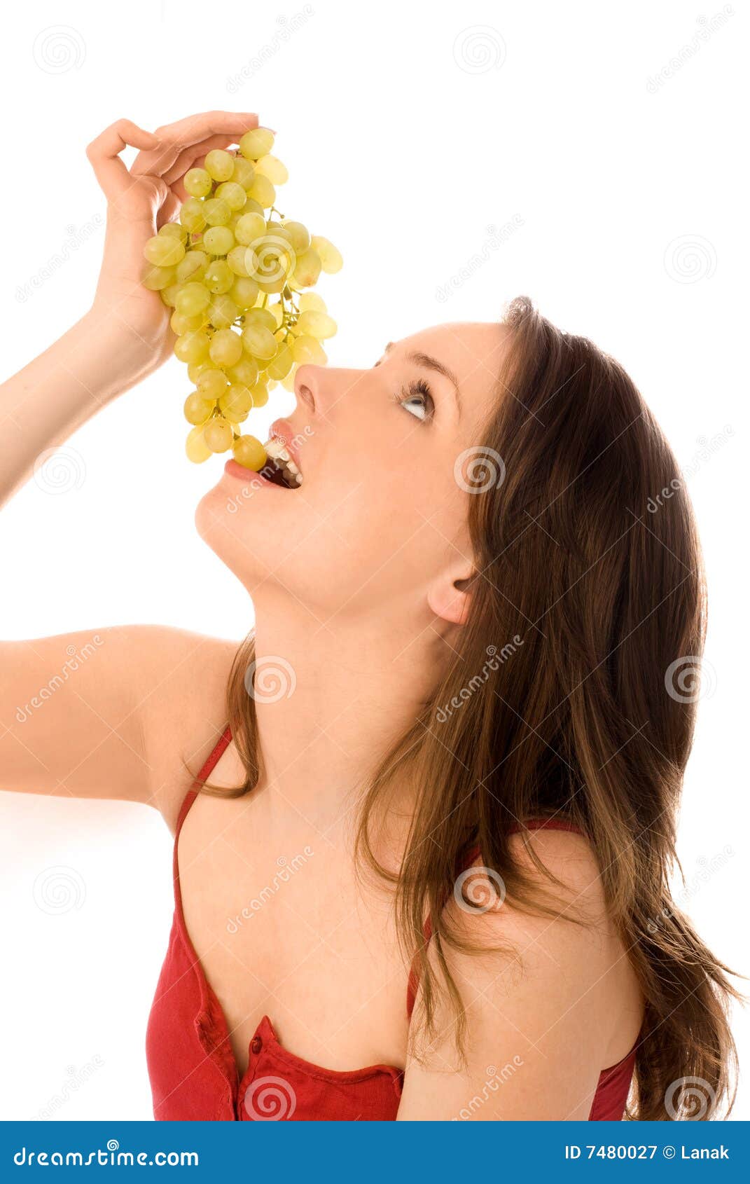 Young woman eating grapes stock image. Image of cook, product 7480027