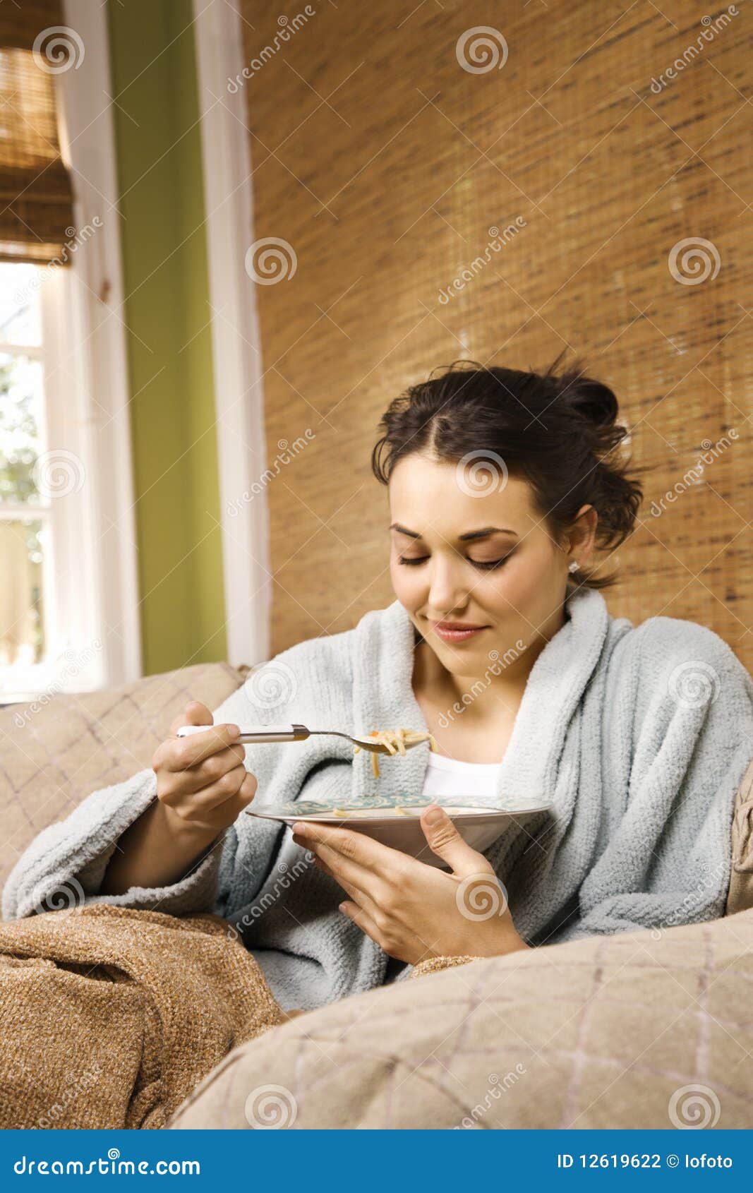 Young Woman Eating Soup stock photo. Image of domicile 12619622