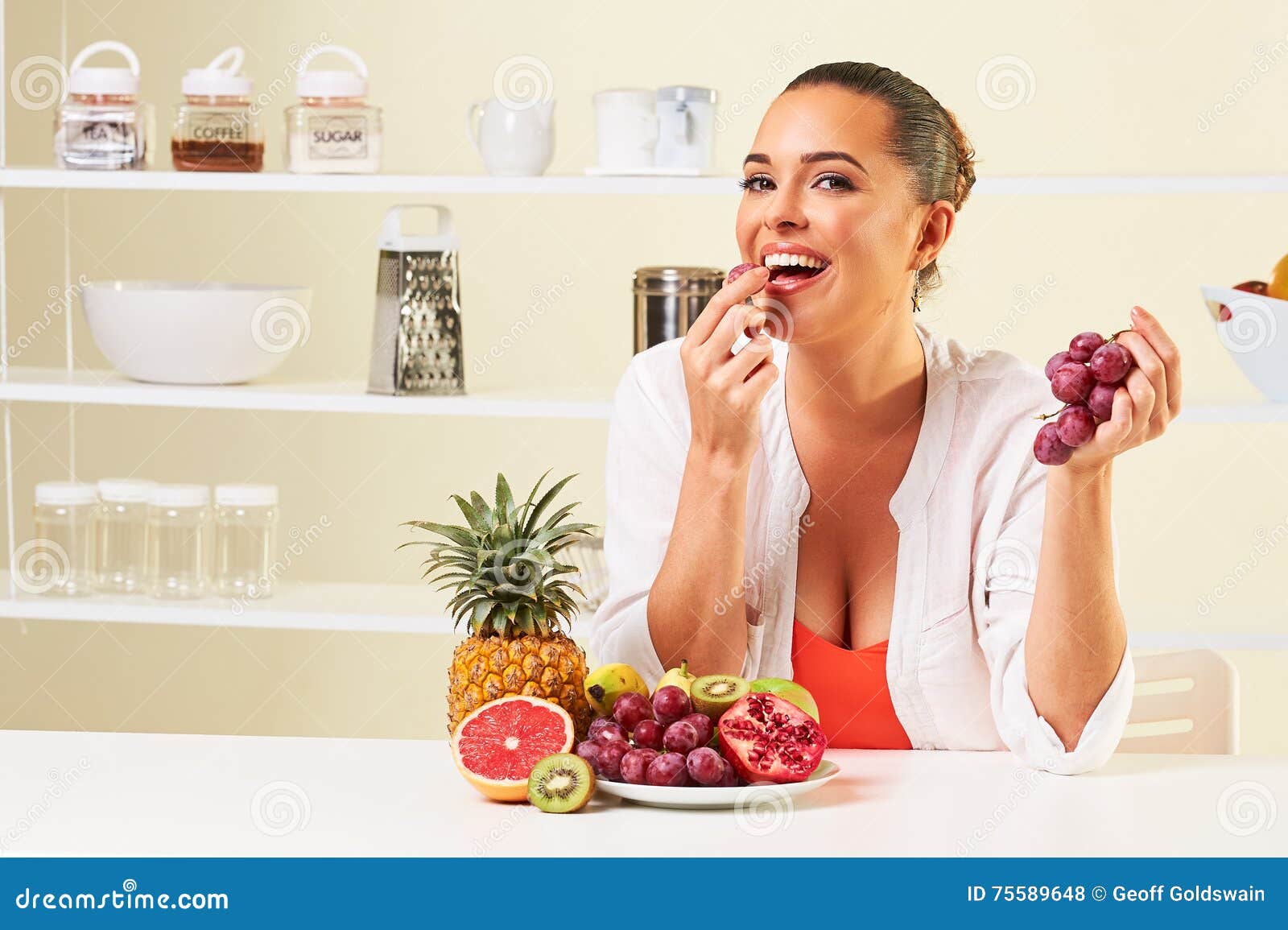 Young Woman Eating Various Fruit Eating Healthy on a Diet Stock Photo