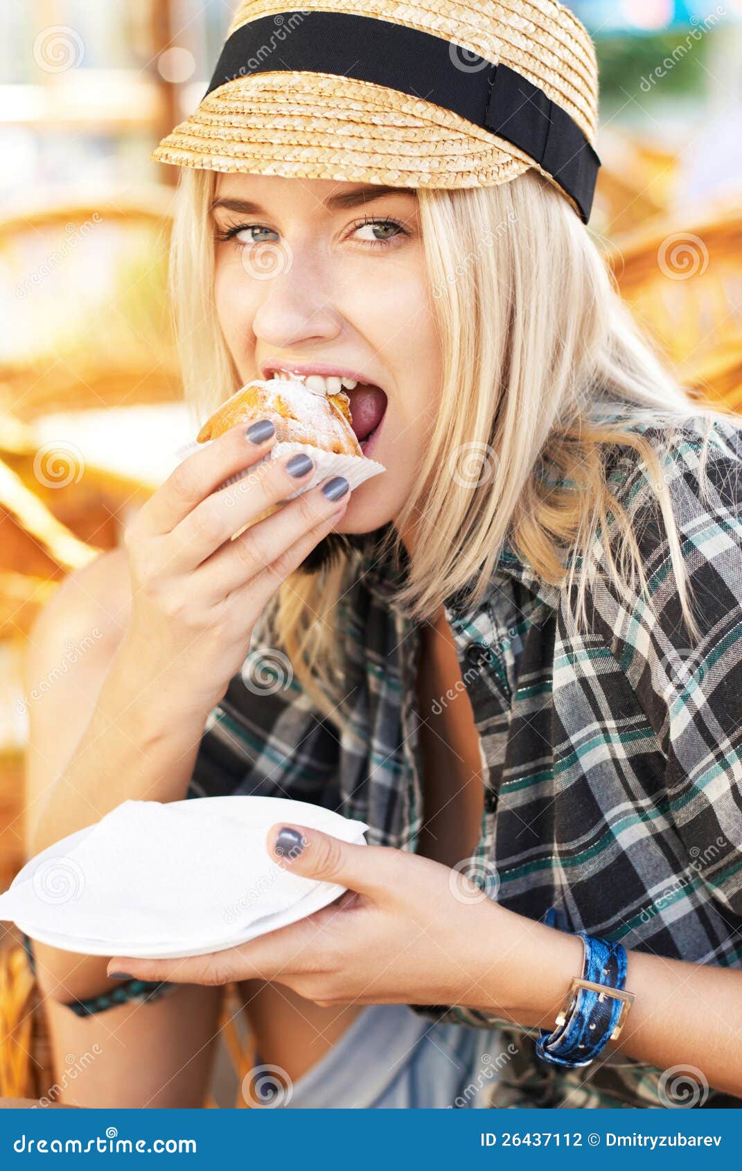Young woman eats muffin stock photo. Image of food, cute 26437112