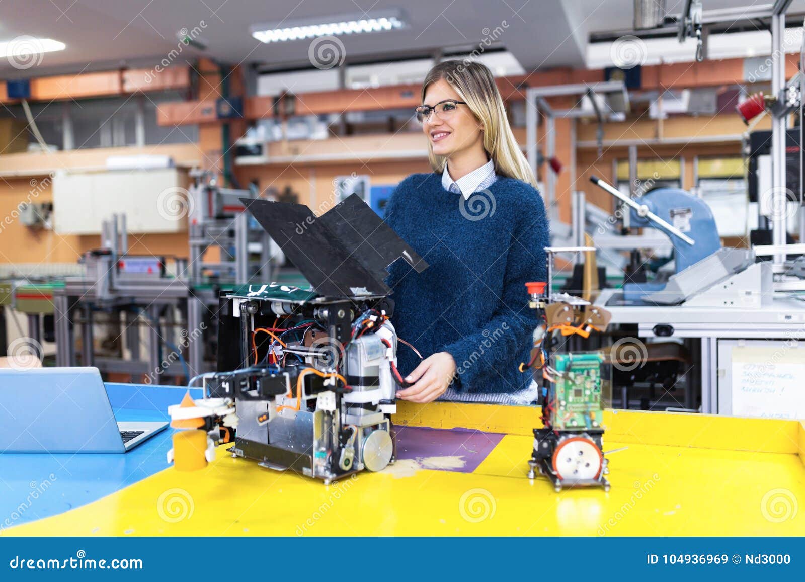 Young Woman Engineer Working on Robotics Project Stock Image Image of