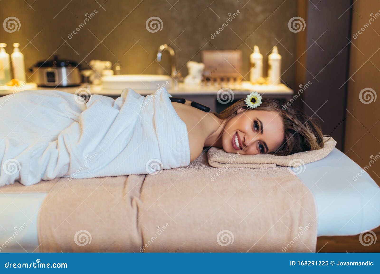 Young Woman Is Enjoying Back Stone Massage At Spa Stock Image Image