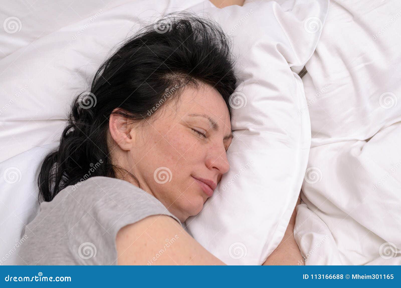 young woman enjoying a good restful sleep