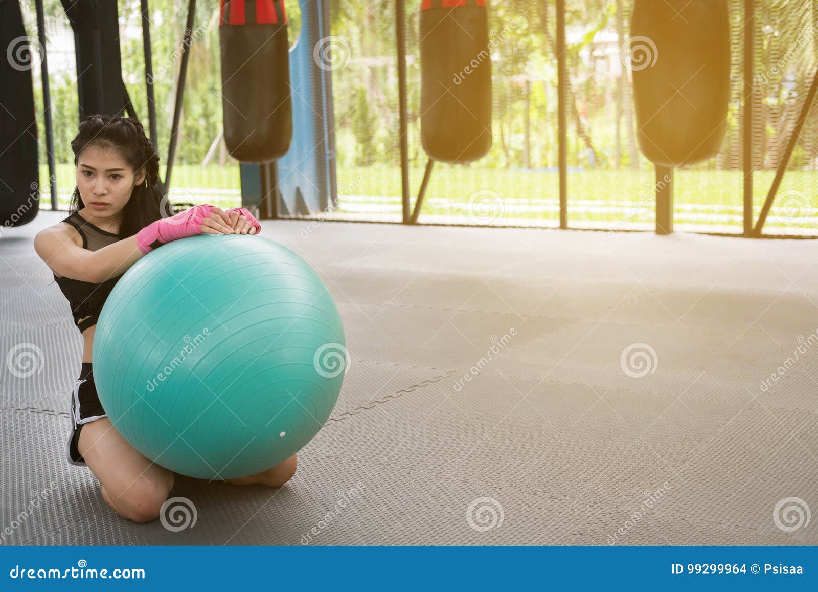 Young Woman Execute Exercise In Fitness Center Female Young Woman Execute Exercise In Fitness Center Female