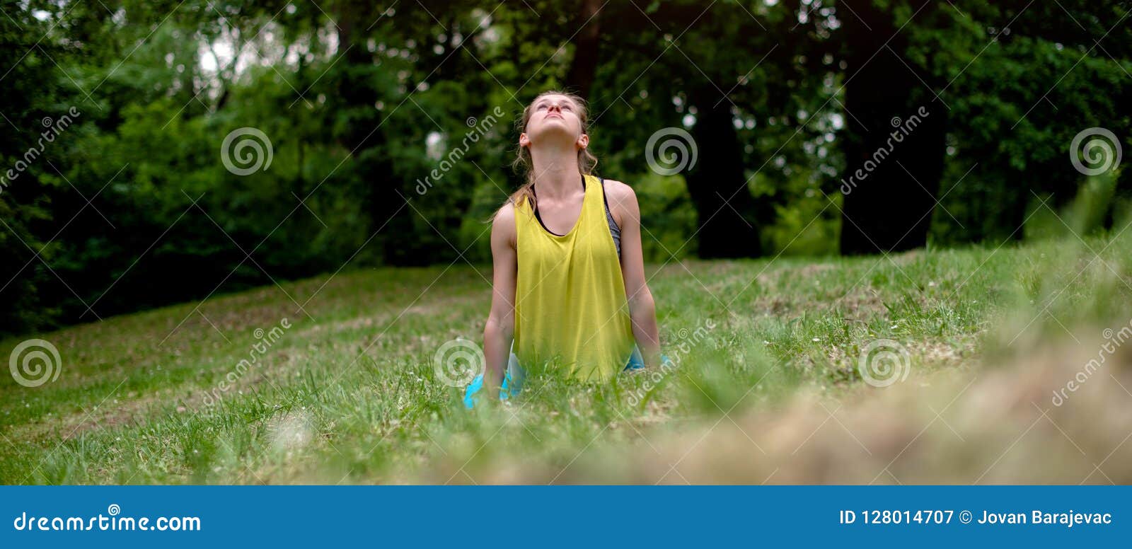 young woman exercing in nature