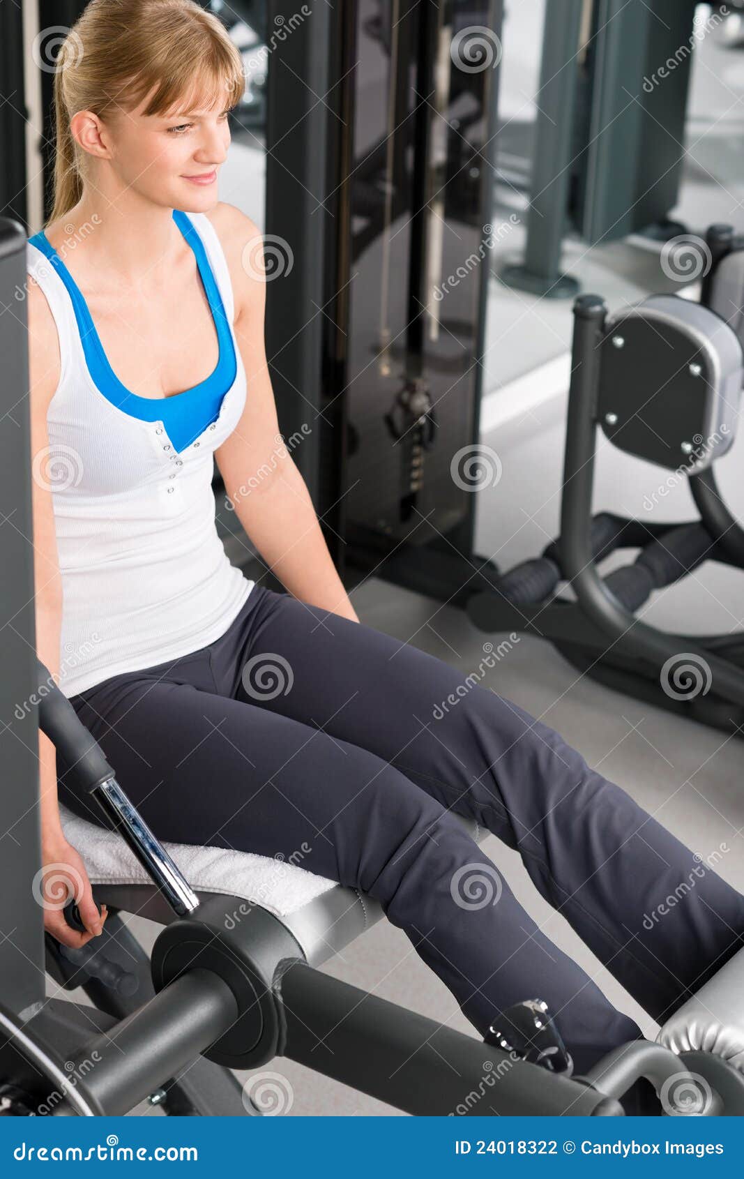 Young Woman Exercise Legs at Fitness Center Stock Photo - Image of ...