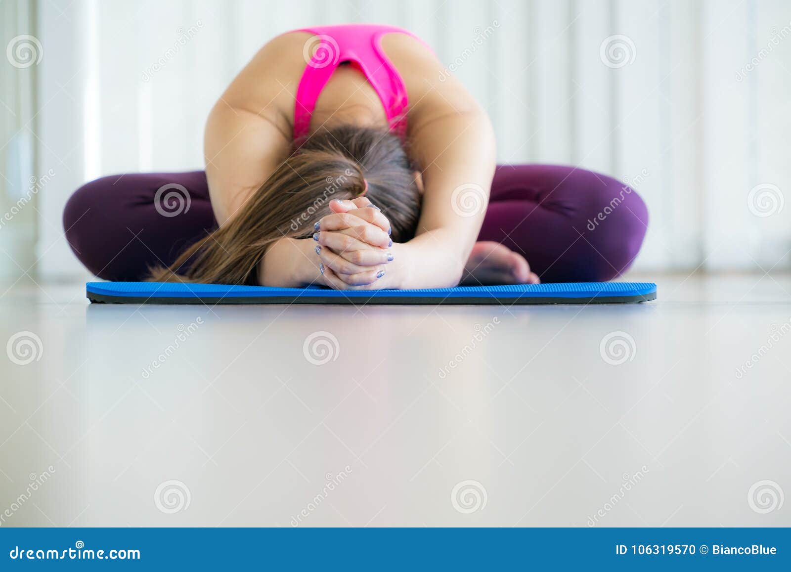 Young Woman Exercising Stretching Back Yoga Pose Stock Photo