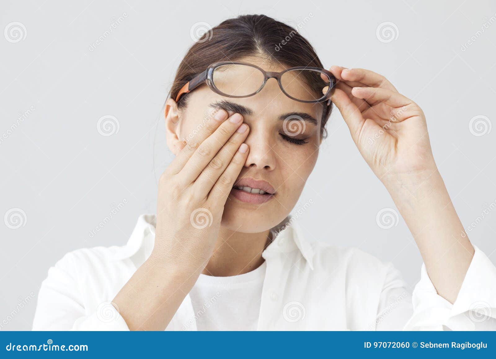 young woman with eye fatigue