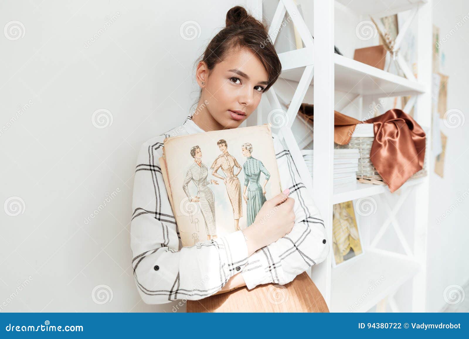 Young Woman Fashion Designer Holding Sketchbook Stock Photo - Image of