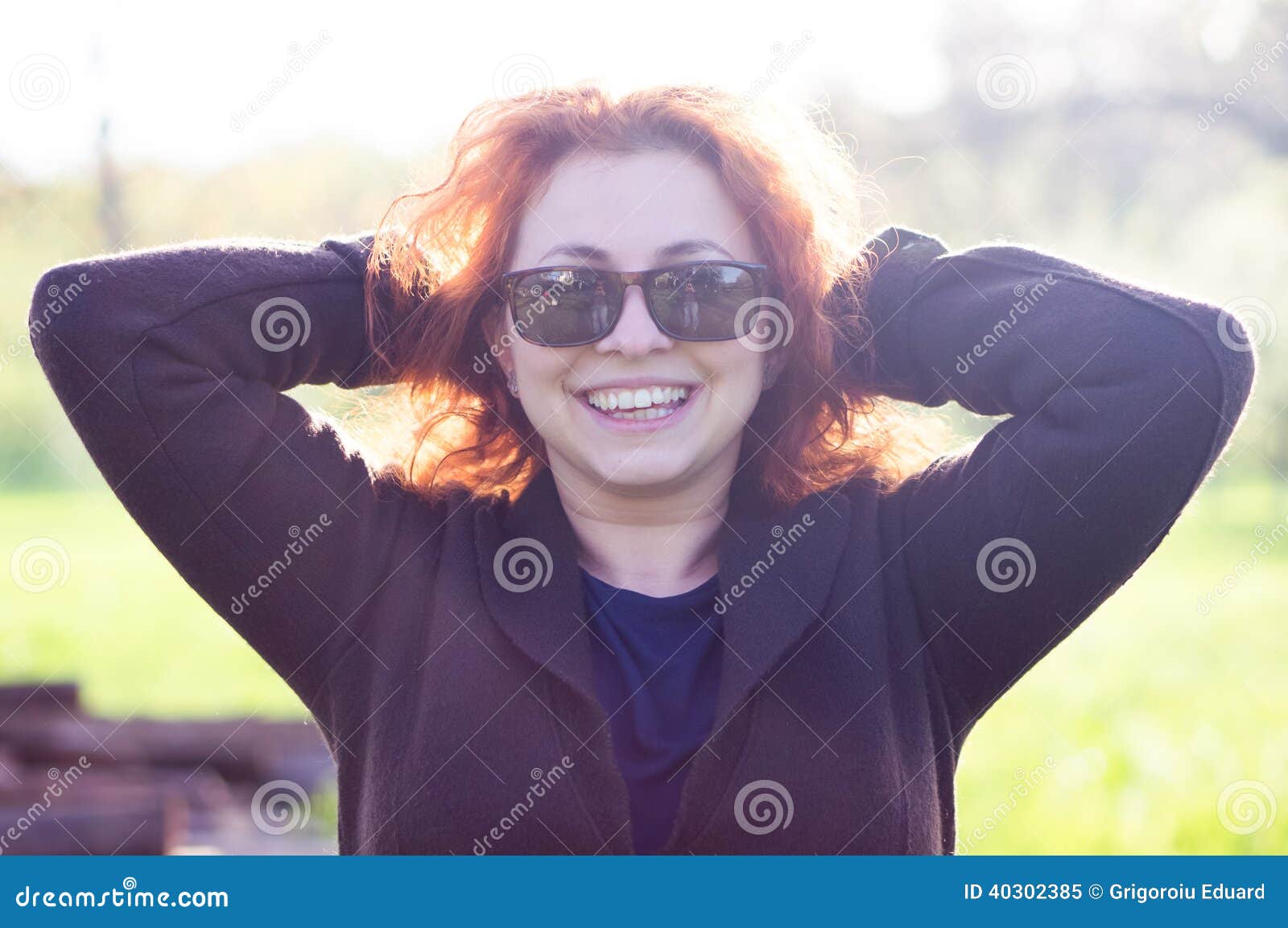young woman feeling happy and laughing