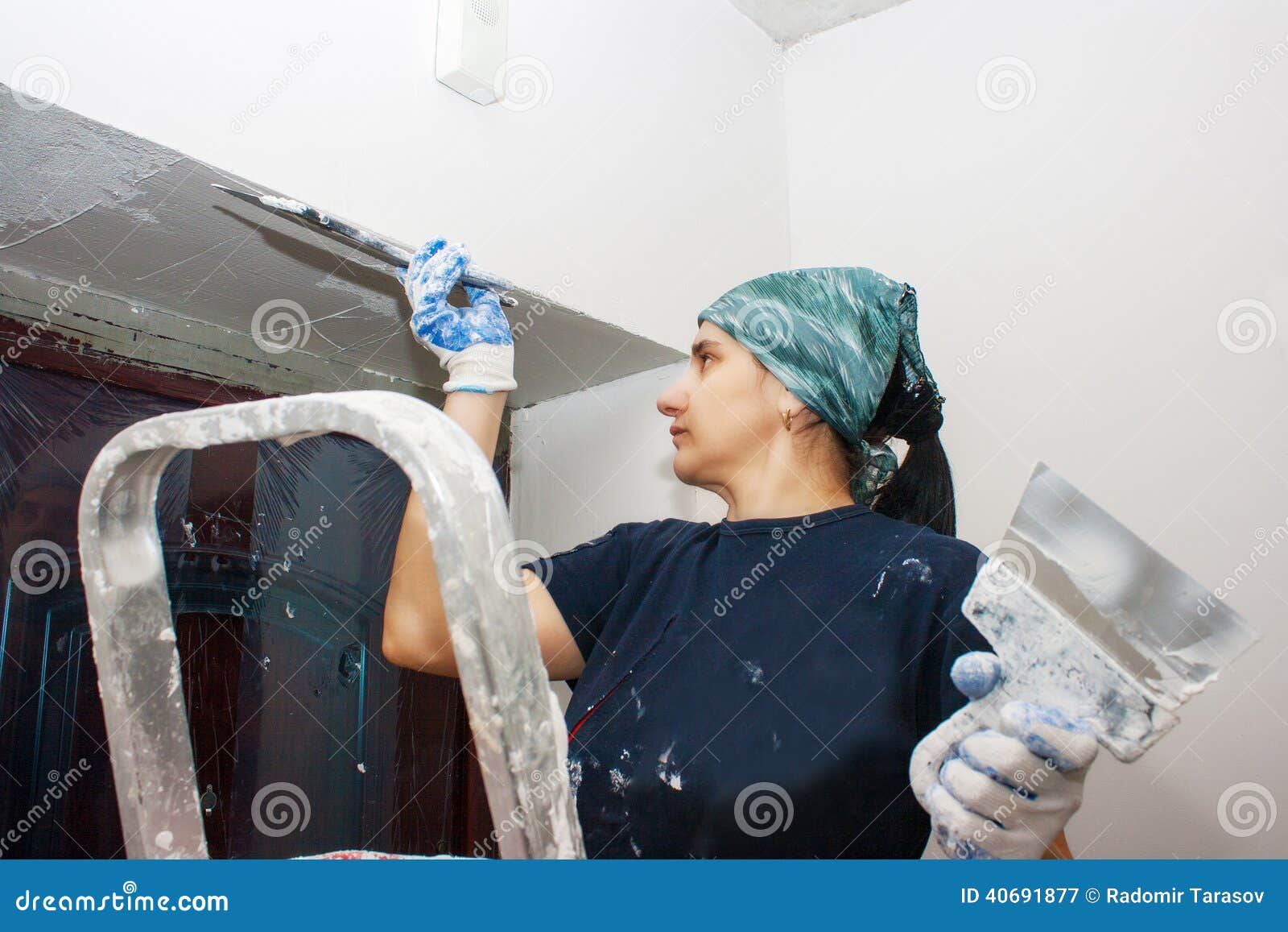 Young Woman Gets White Plaster Wall Stock Image - Image of master