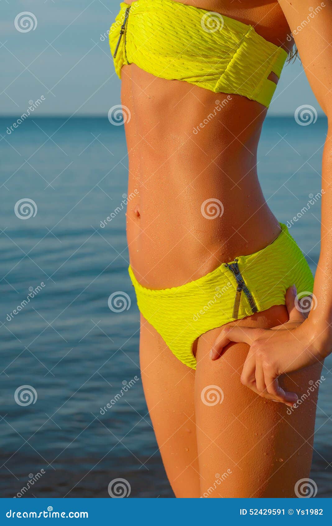 Young Woman in Green Bikini Posing on a Beach Stock Image Image of