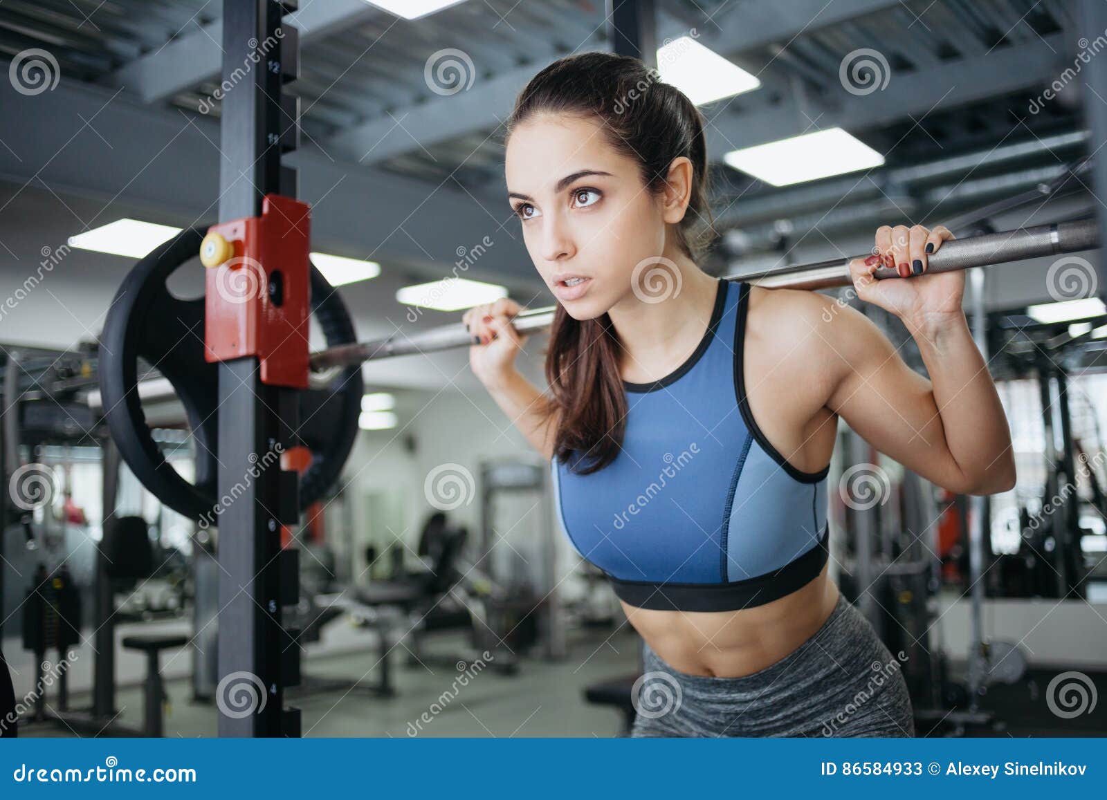 Young Woman at the Gym Using Fitness Equipment. Stock Image - Image of  closeup, girl: 86584933