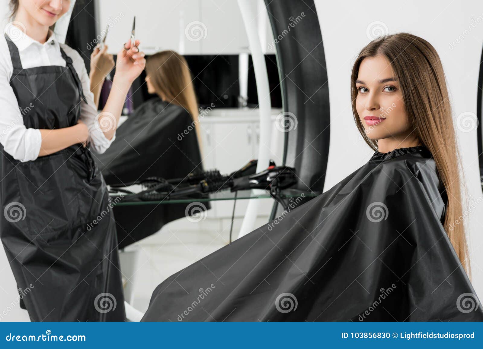 young woman with hair stylist