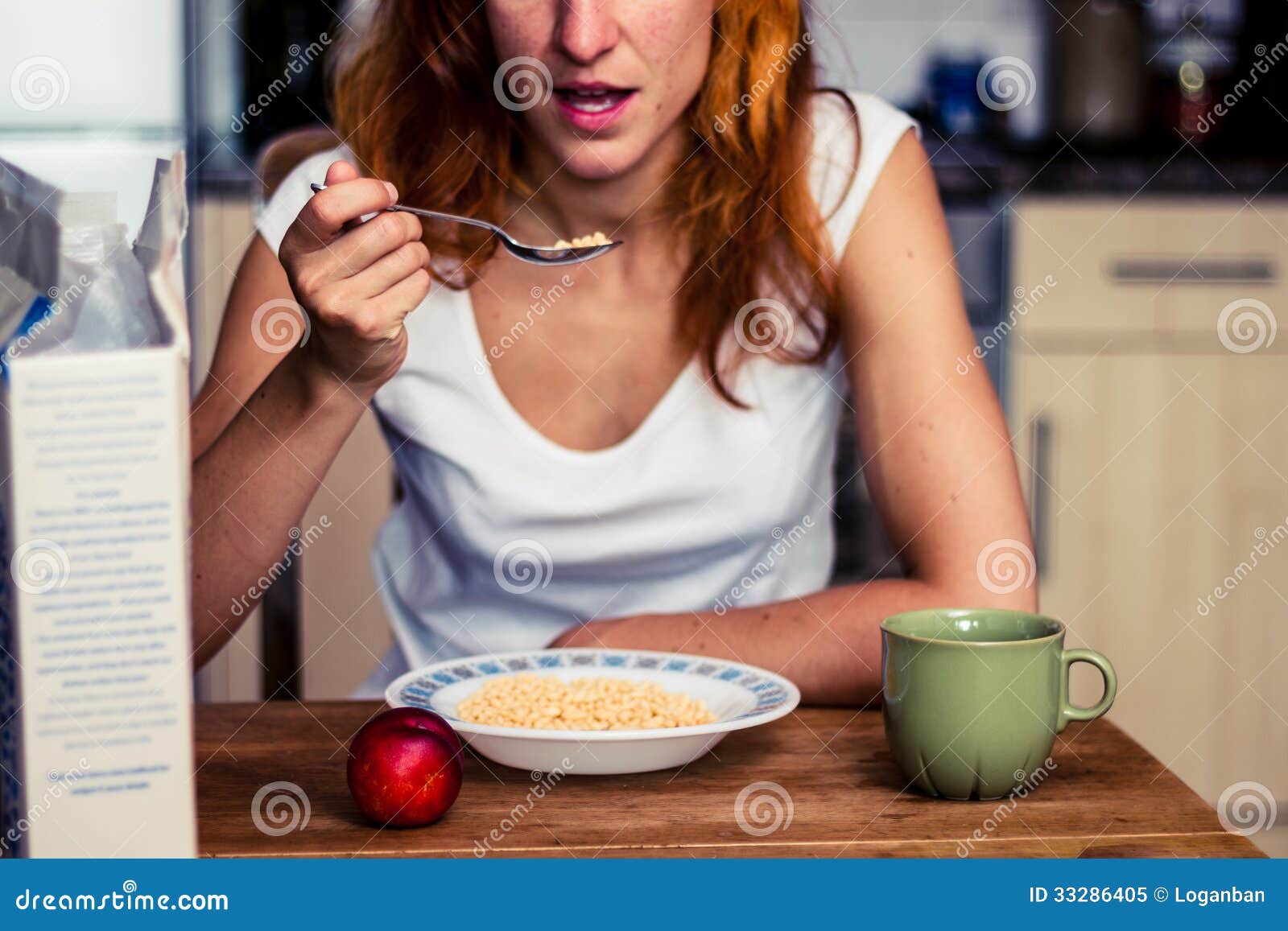 Young Woman Having Cereal and Fruit for Breakfast Stock Image Image